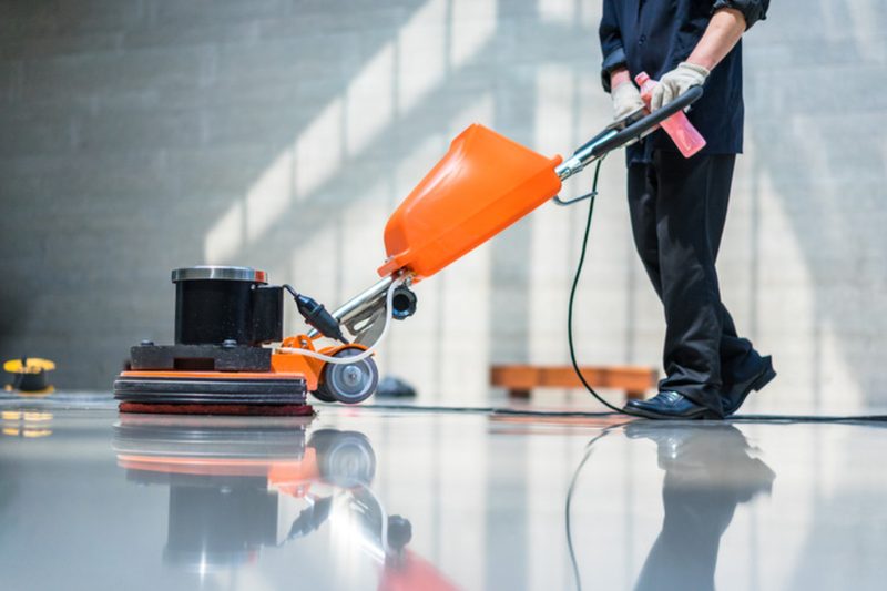Operator finishing a resinous floor